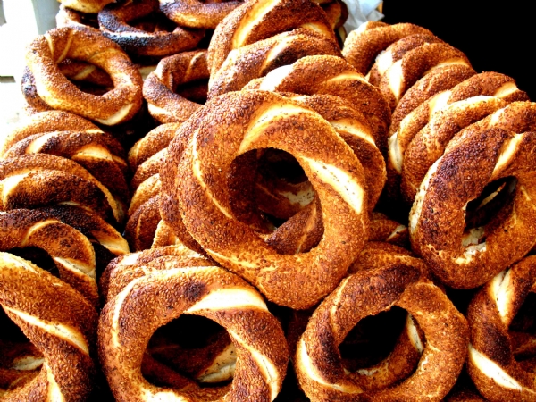 For anyone unfamiliar with the Turkish staple simit, it is a bagel-like bread covered in toasted sesame seeds